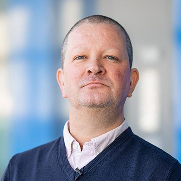 A headshot of Dr Craig Webber
